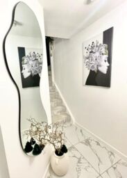 "MirrorOutlet The Lacuna - Frameless Modern Full Length Arched Leaner/Wall Mirror 63"" X 24"" (160CM X 60CM) Silver Mirror Glass with Black wooden Backing - Polished Edging"
