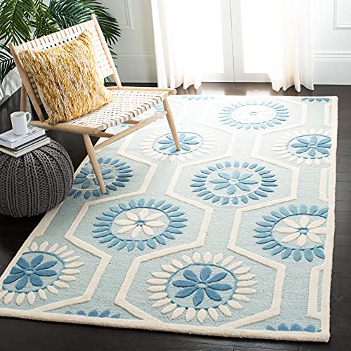 Safavieh Contemporary Indoor Hand Tufted Rectangle Area Rug, Cambridge Collection, CAM715, in Blue / Ivory, 122 X 183 cm for Living Room, Bedroom or Any Indoor Space