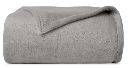 CASUAL LIVING 32596 Roomy Elegant Plush Cozy Soft Silky Solid Flannel Fleece Blanket Machine Washable Bed Blanket for Layering Any Bed for All Season Warmth and Comfort, King/California King, Grey