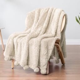 PAVILIA Plush Sherpa Throw Blanket with Pom Pom Fringe, Cream Ivory Beige - Fluffy Fleece Tassel Throw for Sofa Bed Couch - Soft Fuzzy Shaggy Lightweight Decorative Blanket - 50 x 60 in
