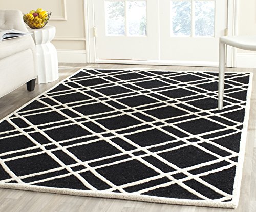 Safavieh Modern Indoor Hand Tufted Rectangle Area Rug, Cambridge Collection, CAM142, in Black / Ivory, 152 X 244 cm for Living Room, Bedroom or Any Indoor Space
