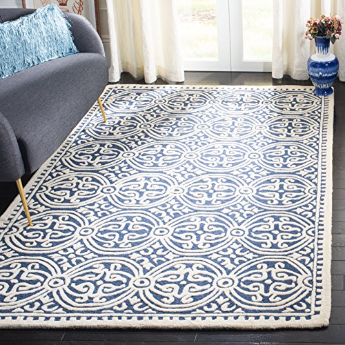 Safavieh Medallion Indoor Hand Tufted Accent Area Rug, Cambridge Collection, CAM123, in Navy Blue / Ivory, 61 X 91 cm for Living Room, Bedroom or Any Indoor Space