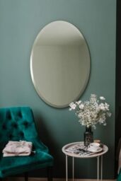 "MirrorOutlet The Ovale - Large Frameless Oval Pond Bevelled Wall Mirror 24"" X 16"" (60cm X 40cm) Silver Mirror Glass On A Black Backing."