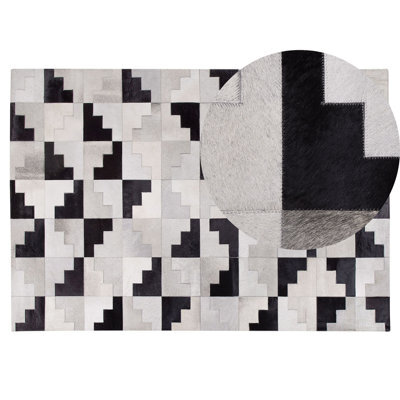 Beliani Rug Efirli Grey 140 X 200 Cm Leather - image 1
