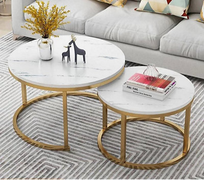 Modern 2 Piece Round Nesting Coffee Table Set With Gold Frame And White Wood Top - image 1