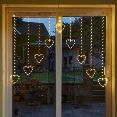 Samuel Alexander 1.2 X 1.2M Light Up Christmas Heart Curtain Lights With 229 Warm White Leds - image 1