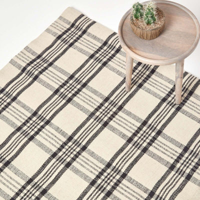 Homescapes Logan Black And White Tartan Check Non-Slip 100% Wool Rug, 120 X 170 Cm - image 1