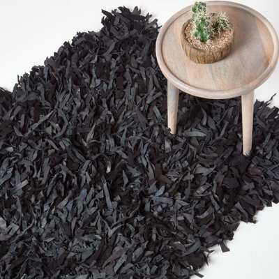Homescapes Dallas Leather Shaggy Rug Black, 90 X 150 Cm - image 1