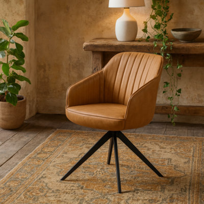 Wyld Haus Arques Tan Faux Leather Swivel Dining Chair With Armrests And Pyramid Metal Legs - image 1