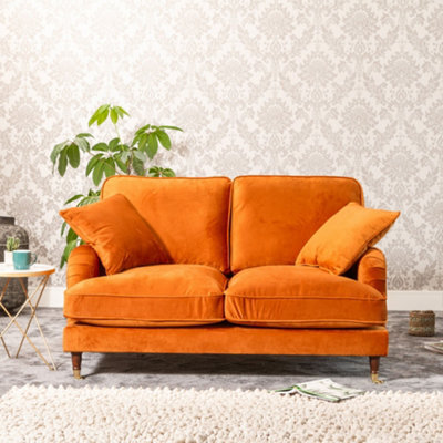 Mackenzie 150Cm Wide Burnt Orange 2 Seat Velvet Fabric Sofa With Brass Coloured Wheel Tipped Walnut Coloured Wooden Legs
