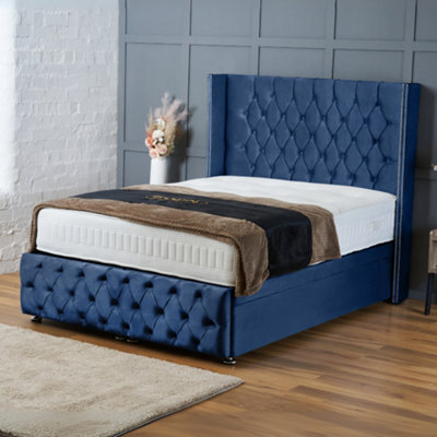 Bsspoke Chesterfield Wingback Bed Ottoman Divan Liftup Storage Bed Blue Velvet 138Cm Headboard& Footboard Free Mattress All Sizes - image 1