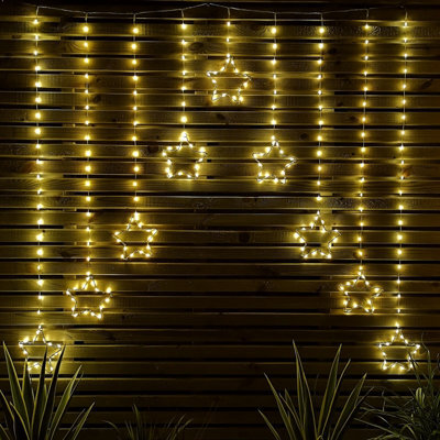 Samuel Alexander 1.2M Light Up Star Curtain Christmas Lights With Warm White Leds - image 1