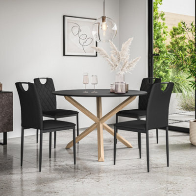 More4Homes Malvern Round Dining Table And Chairs -  Black Table Top W Solid Oak Legs + Monza Faux Leather Dining Chair Set Of 4 (Black) - image 1