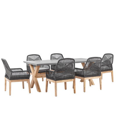 Beliani Garden Dining Set 6 Seater Olbia With Cushions Black - image 1