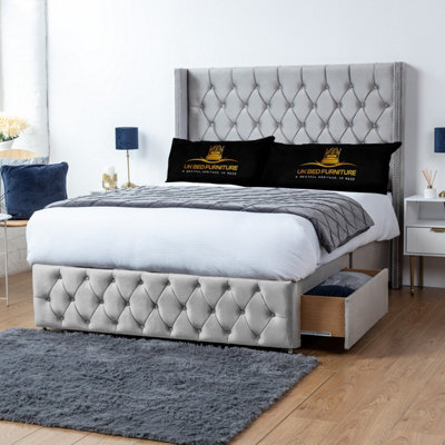 UKBEDFURNITURE Jasmine Silver Plush Wingback Divan Bed 2 Foot End Drawers With 10 Inch Orthopaedic Mattress & 54 Inch Headboard - image 1