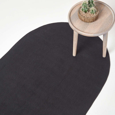 Homescapes Black Handmade Woven Braided Oval Rug, 50 X 80 Cm - image 1