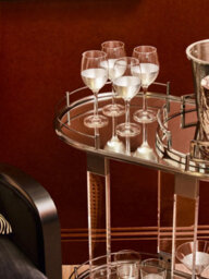 Orsina Metallic Frame Drinks Trolley, Sleek Gold And Black Bar Serving Cart, Functional Two Tier Beverage Trolley - thumbnail 4