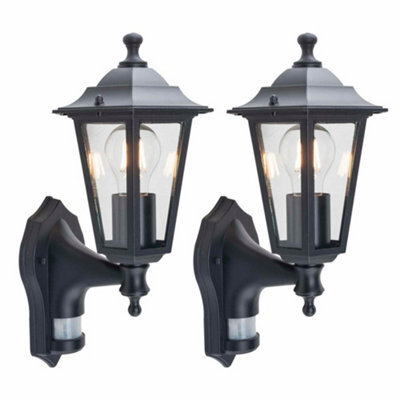 First Choice Lighting Set Of 2 Black Six Sided Lantern Motion Sensor Outdoor Security Lights - image 1