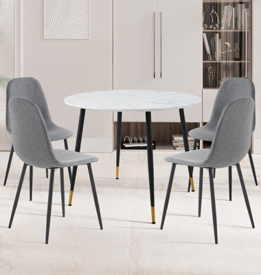 Hallowood Furniture Finley Small Round Dining Table In Marble Finish With 4 Dark Grey Fabric Chairs - image 1