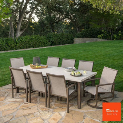 Xample Sunvilla Royce 9 Piece Patio Dining Set Sintered Stone Table Sling Chairs Swivel Rockers Aluminium Frame Cover