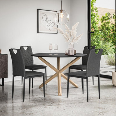 More4Homes Malvern Round Dining Table And Chairs -  Black Table Top W Solid Oak Legs + Monza Fabric Dining Chair Set Of 4 (Charcoal) - image 1
