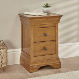 The Furniture Market French Louis Oak 2 Drawer Slim Bedside Table Compact Design With Elegant Detailing, Solid Oak Construction, Antique Brass Handles