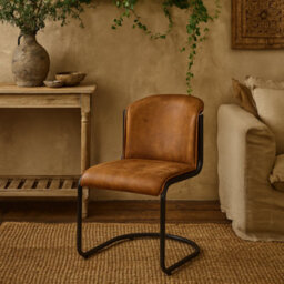 Wyld Haus Germain Arched Tan Faux Leather Dining Chair With Black Cantilever Frame