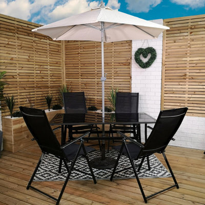 Samuel Alexander Outdoor 4 Person Rectangular Glass Top Garden Dining Table Chairs Beige Parasol And Base Set - image 1
