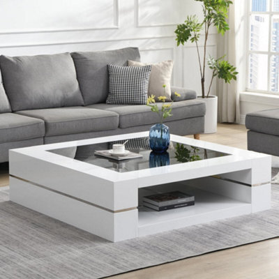 Furniture in Fashion Cyndy High Gloss Coffee Table In White With Black Glass Top - image 1