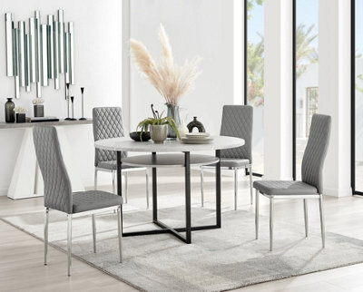 Furniturebox Adley Grey Concrete Effect And Black Round Dining Table With Storage Shelf And 4 Grey And Silver Milan Modern Faux Leather Chairs - image 1