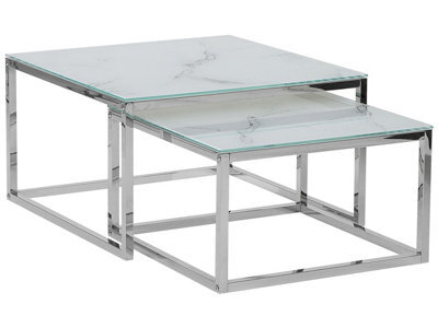 Beliani Nest Of 2 White Marble-Effect Tempered Glass Coffee Tables Silver Frame - image 1