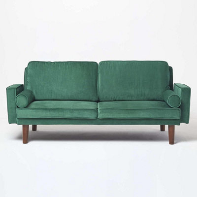 Homescapes Stanley Velvet Click Clack Sofa Bed With Armrests, Dark Green - image 1