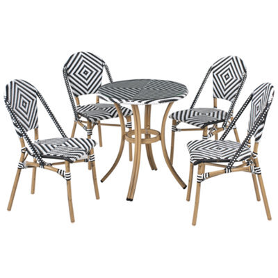 Beliani Garden Dining Set 4 Seater Rifreddo Pe Rattan Black/ White - image 1
