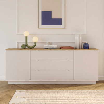 Furniture To Go Ganymede Large Sideboard With 3 Drawers And 2 Doors In Mauvella Oak And Sand - image 1