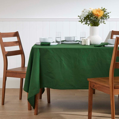 Homescapes Plain Cotton Tablecloth Dark Green 137 X 228 Cm, Rectangular Fabric Dining Table Cloth With Hem Stitch, Hypoallergenic - image 1