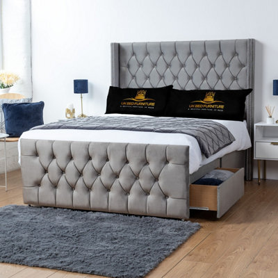 UKBEDFURNITURE Emily Grey Plush Wingback Divan Bed 2 Foot End Drawers With 10 Inch Orthopaedic Mattress & 54 Inch Headboard - image 1