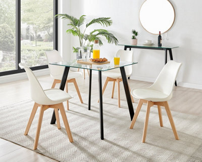 Furniturebox Seattle Scandi Inspired Glass And Black Leg Square Dining Table & 4 White Cushioned Stockholm Beech Wood Leg Chairs - image 1