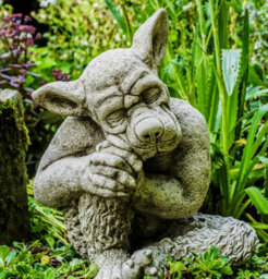 Solid Cast Stone Dog Gargoyle In Sleepy Pose - thumbnail 5