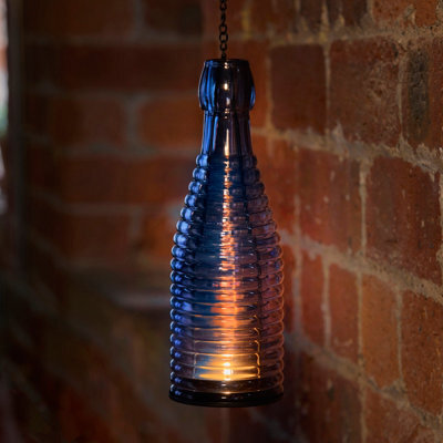 Premier Decorations Limited Blue Mirage Bottle Shape Glass & Metal Tea Light Holder - image 1