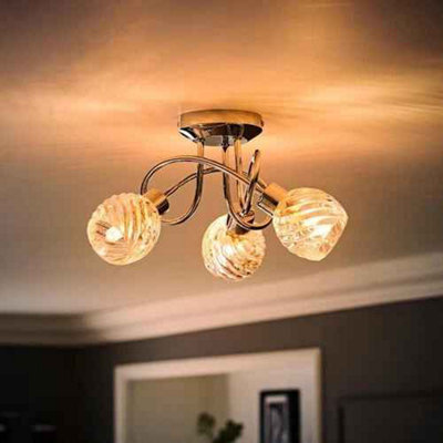 Three Light Ceiling Fitting With Swirl Glass Shades And Adjustable Spotlight Design - image 1