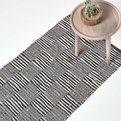 Homescapes Black & White Real Leather Handwoven Striped Block Check Rug, 66 X 200 Cm - image 1