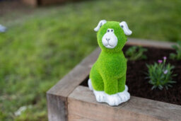 Dog Resin Garden Ornament With Flocked Grass - thumbnail 3
