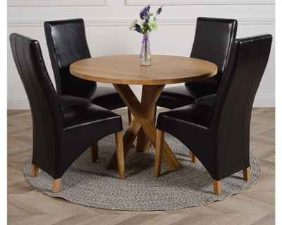 That's Furniture Oregon Round Oak Dining Table And 4 Chairs Dining Set With Lola Black Leather Chairs - image 1