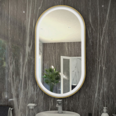RAK Ceramics Rak Art Oval 550X1000mm Brushed Gold Led Bathroom Mirror With Touch Sensor & Demister - image 1
