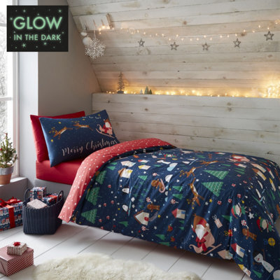 Catherine Lansfield Bedding Kids Santa's Christmas Wonderland Glow In The Dark Duvet Cover Set With Pillowcases Navy - image 1