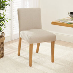 The Furniture Market Monty Natural Oatmeal Fabric Dining Chair Natural Oak Hardwood Legs Modern Minimalist Design Cushioned Seat Minor Assembly