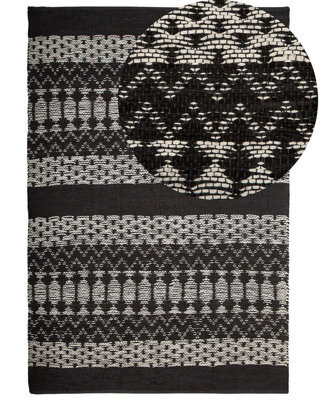 Beliani Rug Sokun Black 140 X 200 Cm Leather - image 1