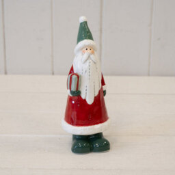 Ceramic Red Santa Holding A Present - thumbnail 1