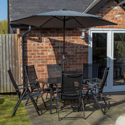 Samuel Alexander Outdoor 6 Person Rectangular Glass Top Garden Dining Table Chairs With Grey Havana Parasol And Base Set - image 1