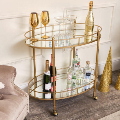 Melody Maison Gold Mirrored Oval Drinks Trolley - image 1